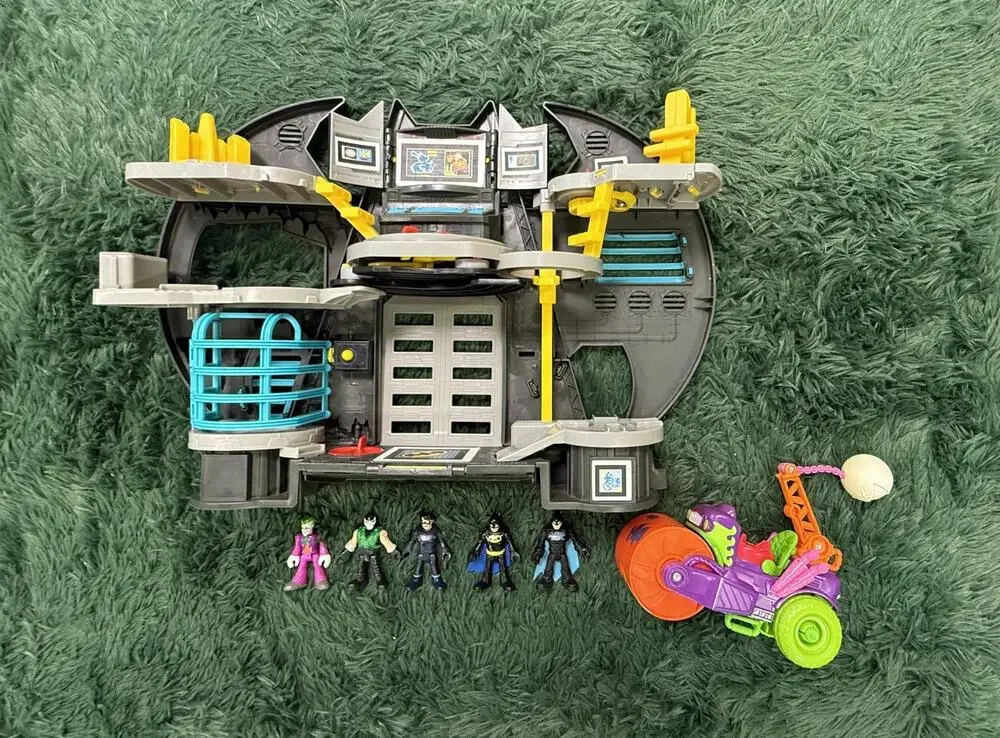 Fisher-Price Imaginext DC Super Friends Batcave Playset with 5 Figures & Vehicle